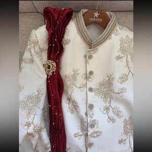 Groom Wedding Cream Embroidered Sherwani with Deep Red Scarf and Brooch